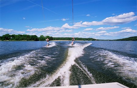 pulled - A man and woman water-skiing Stock Photo - Budget Royalty-Free & Subscription, Code: 400-04536413