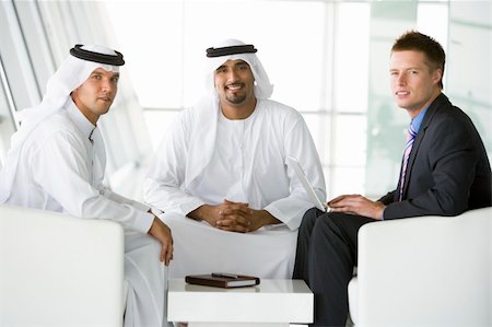 simsearch:400-04037075,k - Two Middle Eastern men and a caucasian man talking at a business Stock Photo - Budget Royalty-Free & Subscription, Code: 400-04536813