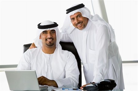 simsearch:400-04037075,k - Two Middle Eastern businessmen beside a laptop Stock Photo - Budget Royalty-Free & Subscription, Code: 400-04536820