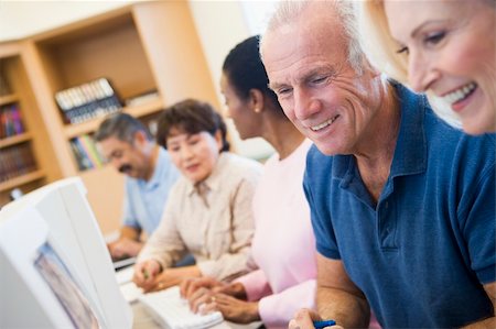 Mature students learning computer skills Stock Photo - Budget Royalty-Free & Subscription, Code: 400-04537077