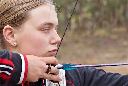 simsearch:400-09110096,k - great image of a teenage girl doing archery Photographie de stock - Aubaine LD & Abonnement, Code: 400-04537154