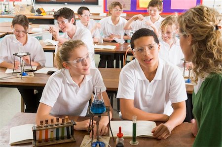 focus group table - Schoolchildren and teacher in science class Stock Photo - Budget Royalty-Free & Subscription, Code: 400-04537392