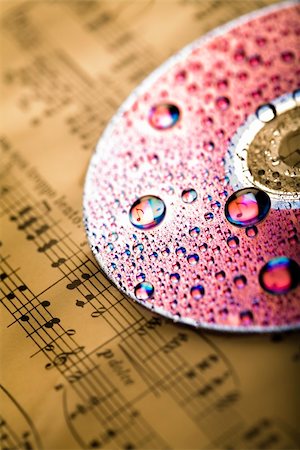 Music, water drops and reflections of notes on disc. Stock Photo - Budget Royalty-Free & Subscription, Code: 400-04537492