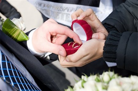 red jewellery boxes - two wedding rings in the box which takes a man Stock Photo - Budget Royalty-Free & Subscription, Code: 400-04537545