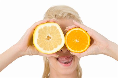 simsearch:859-07845866,k - pretty lady covering her eyes with slice of fruits on isolated studio pictures Stock Photo - Budget Royalty-Free & Subscription, Code: 400-04537571