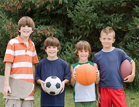 Four Boys All With Different Sports Items Stock Photo - Budget Royalty-Free & Subscription, Code: 400-04537631