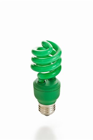 Bright green compact fluorescent light bulb isolated on a white background. Foto de stock - Royalty-Free Super Valor e Assinatura, Número: 400-04537873