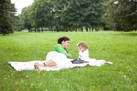 simsearch:400-04795754,k - happy family on green meadow Stock Photo - Budget Royalty-Free & Subscription, Code: 400-04538568
