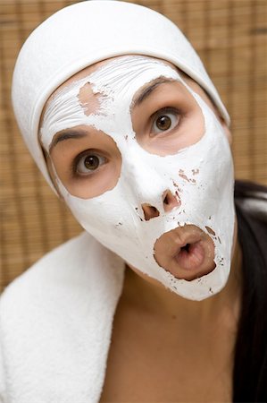 attractive brunette woman with facial mask Stock Photo - Budget Royalty-Free & Subscription, Code: 400-04538569