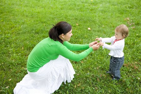simsearch:400-08787277,k - happy family on green meadow Stock Photo - Budget Royalty-Free & Subscription, Code: 400-04538595