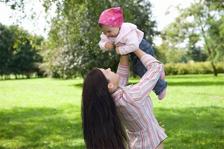 simsearch:400-08787277,k - happy family on green meadow Stock Photo - Budget Royalty-Free & Subscription, Code: 400-04538598