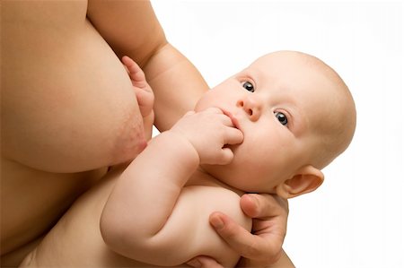 child of one and year old sucks a breast of mom Stock Photo - Budget Royalty-Free & Subscription, Code: 400-04538675