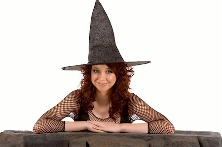 simsearch:400-04007612,k - Portrait of Latina teenager girl in black Halloween hat and fishnet dress Stock Photo - Budget Royalty-Free & Subscription, Code: 400-04539214