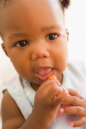 simsearch:400-04044714,k - Baby eating carrot Stock Photo - Budget Royalty-Free & Subscription, Code: 400-04539441