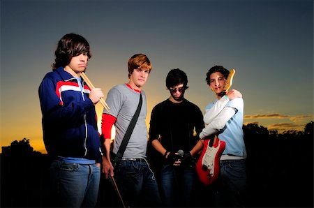 simsearch:400-04547071,k - Portrait of young trendy musicians group posing Stock Photo - Budget Royalty-Free & Subscription, Code: 400-04539823