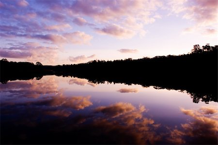 simsearch:400-04016295,k - Sun sets over a peaceful lake Stockbilder - Microstock & Abonnement, Bildnummer: 400-04530483