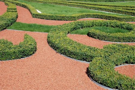 Ornamental garden, red and green contrasts Stockbilder - Microstock & Abonnement, Bildnummer: 400-04530588