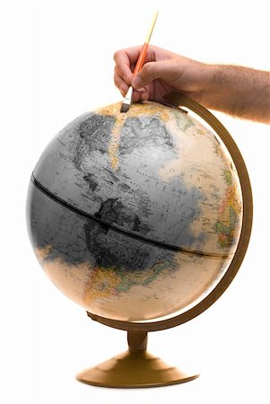 A model of the earth being painted as a symbolic way of showing someone brightening up the planet Stock Photo - Budget Royalty-Free & Subscription, Code: 400-04530745