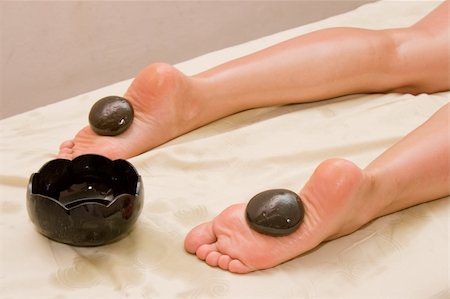 shiatsu - Foot stone massage in spa Foto de stock - Super Valor sin royalties y Suscripción, Código: 400-04530838