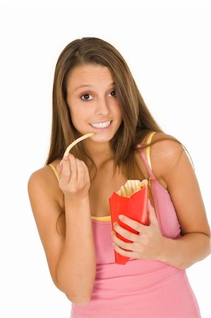 french fry smile - Caucasian woman eating junk food on a white background Stock Photo - Budget Royalty-Free & Subscription, Code: 400-04532239