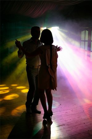 simsearch:400-04440941,k - Dancing pair on a background of rays of light Fotografie stock - Microstock e Abbonamento, Codice: 400-04532279