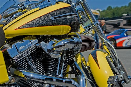 Yellow motorcycle along the road. Stock Photo - Budget Royalty-Free & Subscription, Code: 400-04532365