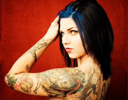 simsearch:400-05054627,k - Pretty young woman with many tattoos on her back and arms Stock Photo - Budget Royalty-Free & Subscription, Code: 400-04532399