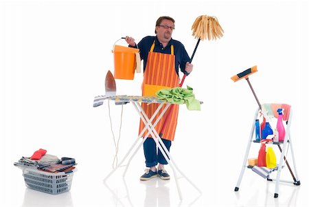 Houseman with cleansing tools doing household, cleaning and ironing Stock Photo - Budget Royalty-Free & Subscription, Code: 400-04532527