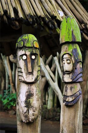 Two wooden totems (idols) near african village Stock Photo - Budget Royalty-Free & Subscription, Code: 400-04532842