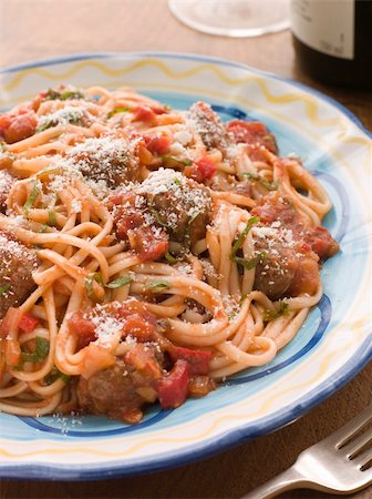 simsearch:400-04532905,k - Plate of Spaghetti Meatballs in Tomato sauce with Parmesan Photographie de stock - Aubaine LD & Abonnement, Code: 400-04532905