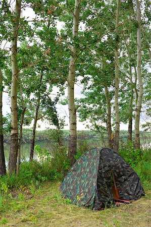 selhin (artist) - Preparation for accommodations and recreation. In the shade of trees near the river tent set, double. Photographie de stock - Aubaine LD & Abonnement, Code: 400-04532954