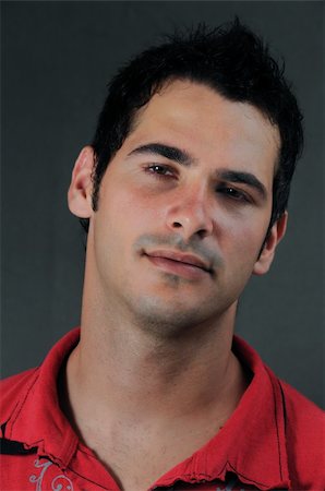 simsearch:400-04167868,k - Headshot of young handsome hispanic male with serious expression Fotografie stock - Microstock e Abbonamento, Codice: 400-04533413