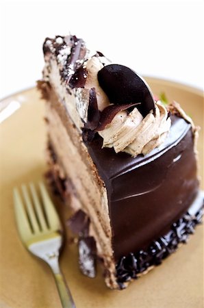 simsearch:400-04529617,k - Slice of chocolate mousse cake served on a plate Photographie de stock - Aubaine LD & Abonnement, Code: 400-04533460