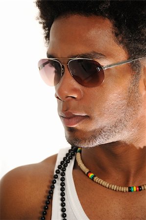simsearch:400-04539832,k - Portrait of young trendy african american man posing with sunglasses Foto de stock - Royalty-Free Super Valor e Assinatura, Número: 400-04544368