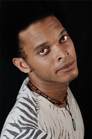 simsearch:400-04163139,k - Portrait of young trendy african american man posing Photographie de stock - Aubaine LD & Abonnement, Code: 400-04544371