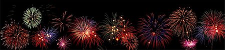 simsearch:400-06416200,k - Line of colorful fireworks over black background Stock Photo - Budget Royalty-Free & Subscription, Code: 400-04544806