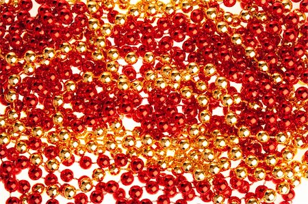 Red and golden volumetric decoration texture, consists of tiny shiny beads Stock Photo - Budget Royalty-Free & Subscription, Code: 400-04545592