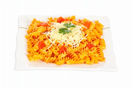 fusilli with vegetables - Freshly cooked plate of fusilli pasta with tomato sauce just for eating. Shallow depth of field Stock Photo - Budget Royalty-Free & Subscription, Code: 400-04545698