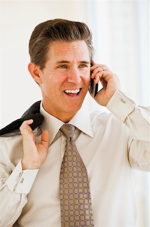 simsearch:400-04164036,k - cheerful businessman having conversation on cell phone Foto de stock - Super Valor sin royalties y Suscripción, Código: 400-04545778