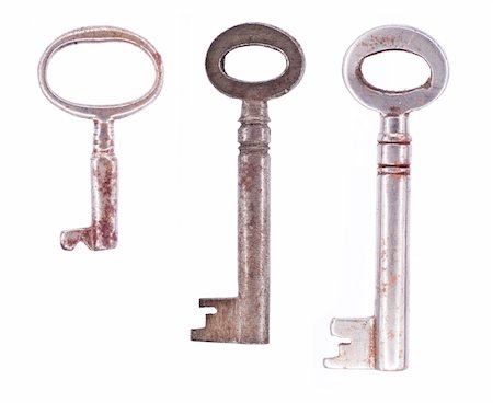 Three ornate vintage keys isolated on a white background. Stockbilder - Microstock & Abonnement, Bildnummer: 400-04545886