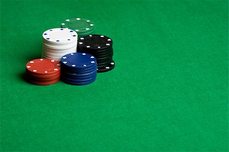 A background with poker chips and green felt Stock Photo - Budget Royalty-Free & Subscription, Code: 400-04545894