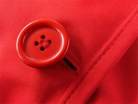 simsearch:400-05303269,k - red clothes fragment with button Stock Photo - Budget Royalty-Free & Subscription, Code: 400-04545986