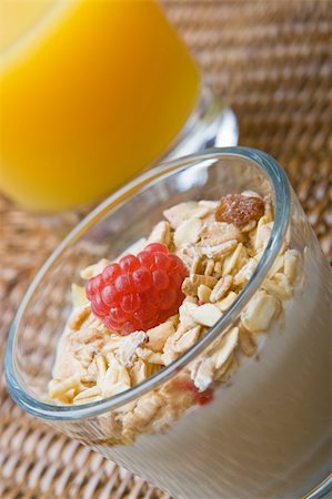 simsearch:400-04859746,k - Fresh yogurt and muesli with a raspberry and a glass of orange juice Foto de stock - Super Valor sin royalties y Suscripción, Código: 400-04546167