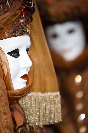 simsearch:400-04546218,k - White mask  with a brown costume at the Venice Carnival Stock Photo - Budget Royalty-Free & Subscription, Code: 400-04546216