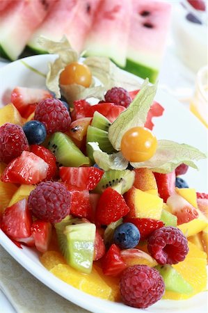 Delicious fruit salad with fresh fruits and low calorie Stock Photo - Budget Royalty-Free & Subscription, Code: 400-04546413