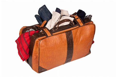 Overstuffed baggage in old suitcase isolated on white background Stock Photo - Budget Royalty-Free & Subscription, Code: 400-04546424