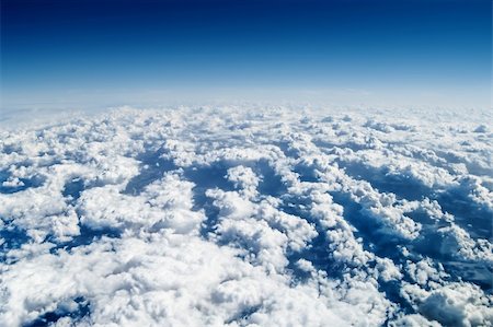 View from airplane window over the clouds Stock Photo - Budget Royalty-Free & Subscription, Code: 400-04546436