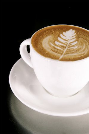 simsearch:400-04546601,k - Latte Art on a Cappucinno Foto de stock - Royalty-Free Super Valor e Assinatura, Número: 400-04546600