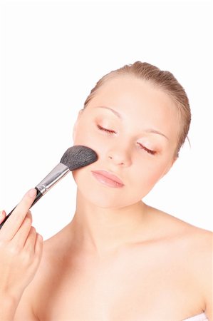 dead_morozzzka (artist) - Someone is doing make-up for an attractive girl standing over white background Photographie de stock - Aubaine LD & Abonnement, Code: 400-04546903
