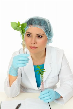 Botanical scientist observing or studying plants in test tubes Stock Photo - Budget Royalty-Free & Subscription, Code: 400-04547398